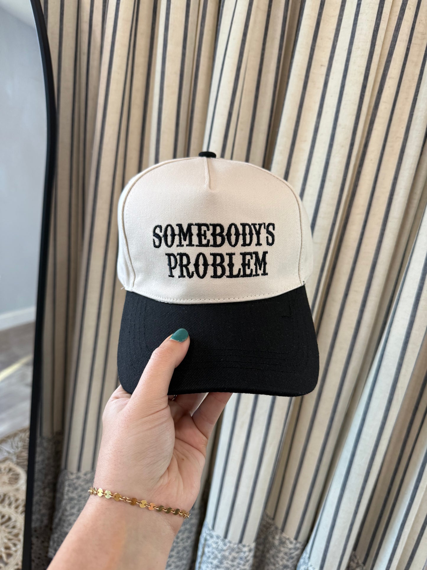 SOMEBODY’S PROBLEM